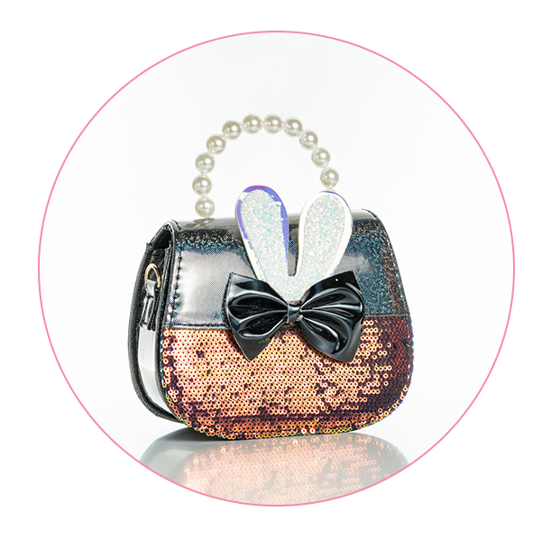 A small, elegant handbag with a black and bronze color scheme