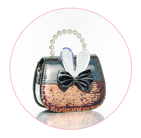 A small, elegant handbag with a black and bronze color scheme