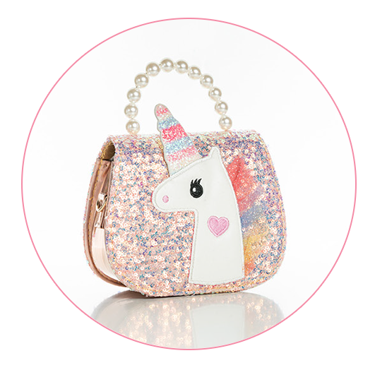 A white unicorn face applique bag with a pastel rainbow mane