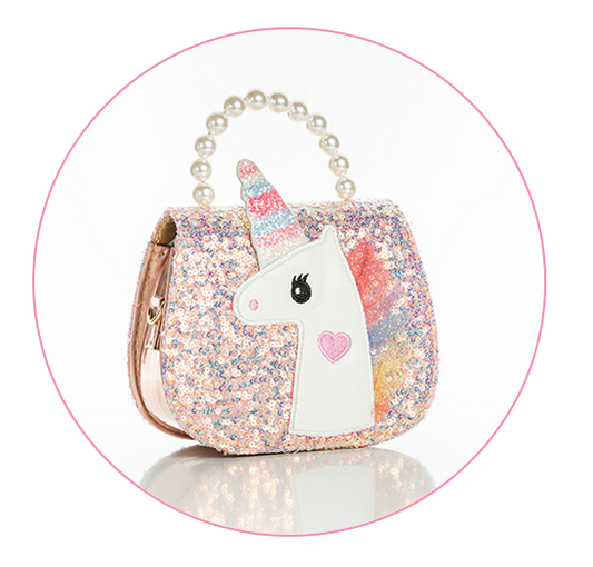 A white unicorn face applique bag with a pastel rainbow mane