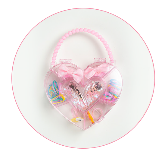 A heart-shaped plastic accessory case with a pink beaded handle