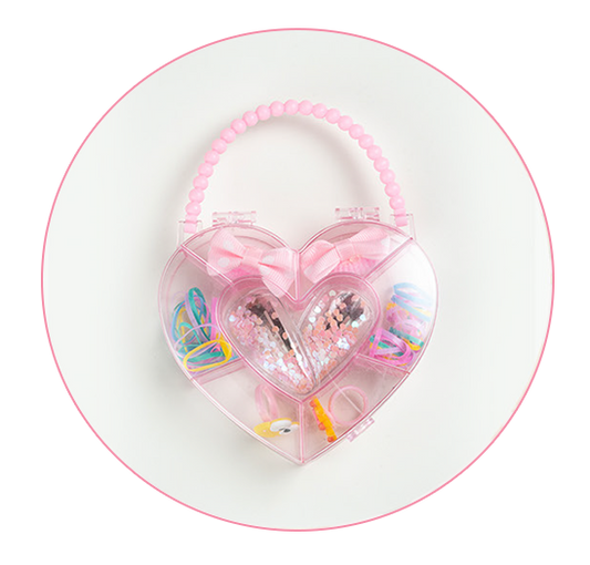 A heart-shaped plastic accessory case with a pink beaded handle